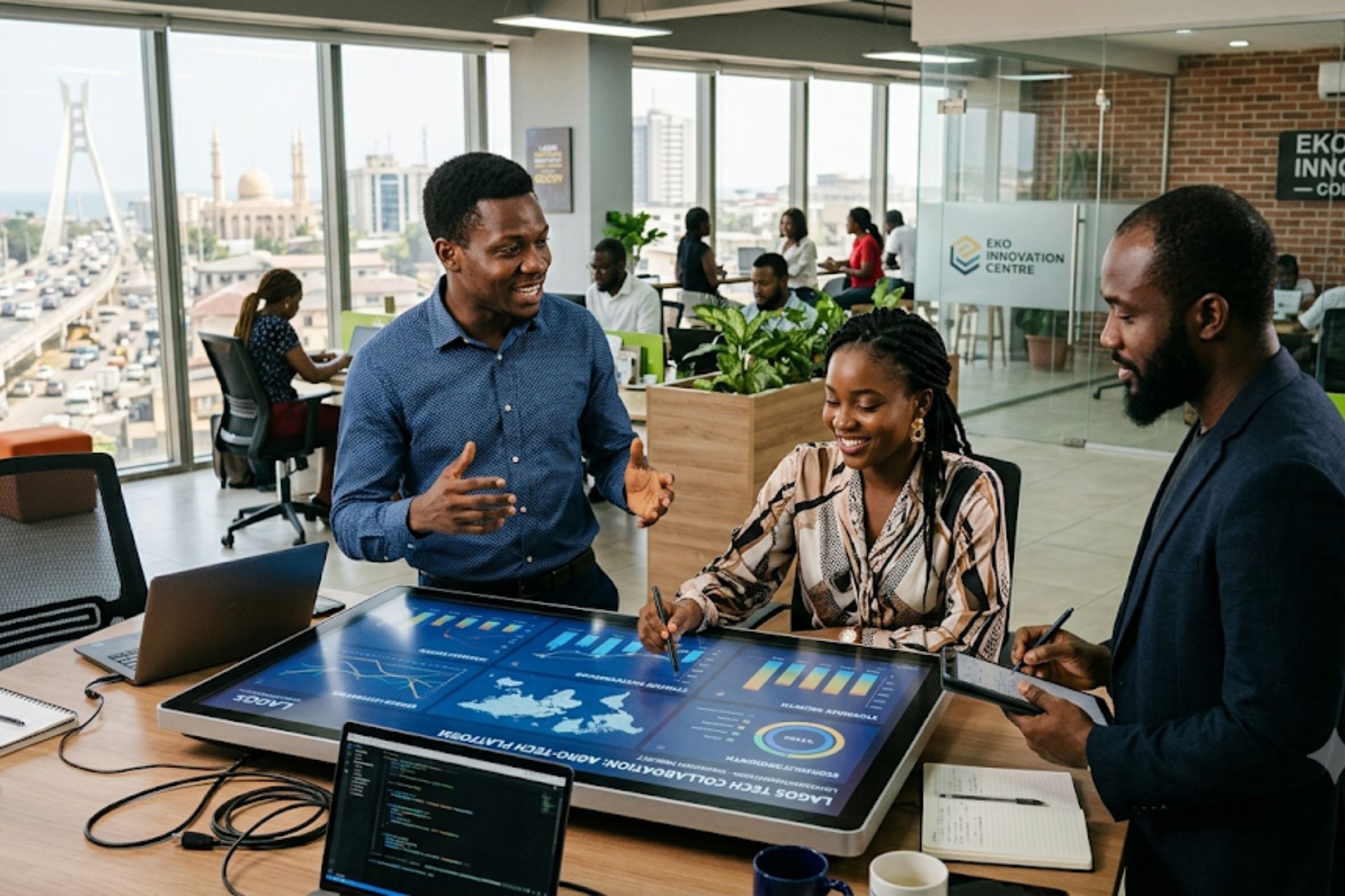Technology and Business Collaboration in Lagos: Driving Innovation and Economic Growth Tech entrepreneurs and business executives collaborating in a modern Lagos office environment