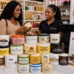 African model purchasing the best Body Butter listed below in a Nigeria cosmetic store on a counter. Palmer's Cocoa Butter Formula Body Butter