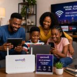 Black Nigerian family using Spectranet 4G LTE router for high-speed internet at home