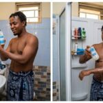 African woman comparing exfoliating shower gel and regular shower gel during a body care routine in a Nigerian bathroom.