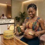 Stretch Mark Cream vs Shea Butter: Which Is Better for Preventing Stretch Marks? African pregnant woman applying stretch mark cream and shea butter to her belly for moisturized, healthy skin.